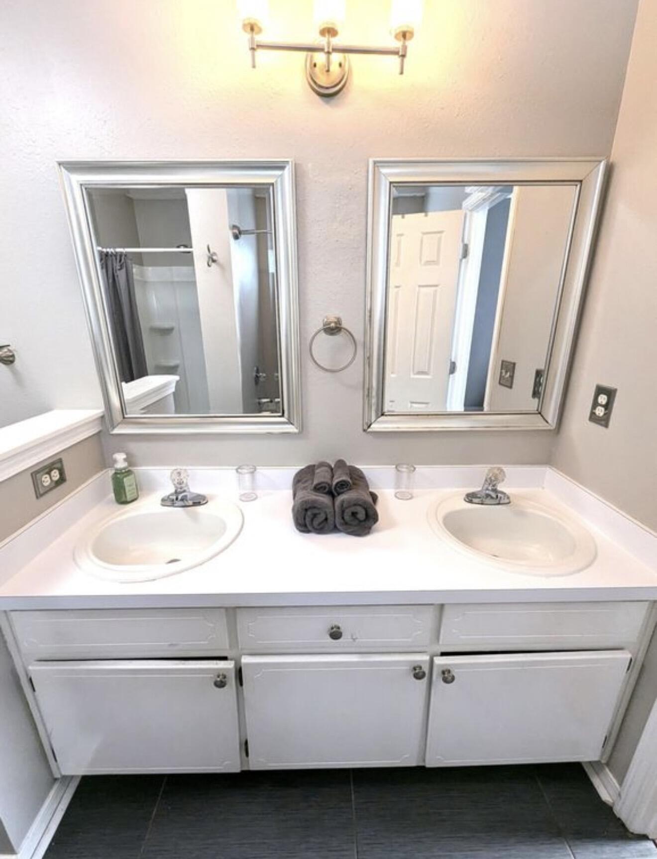 431 Sandy Ridge Circle Mary Esther, FL 32569 - Photo 9 of 16 a bathroom with a sink and a mirror