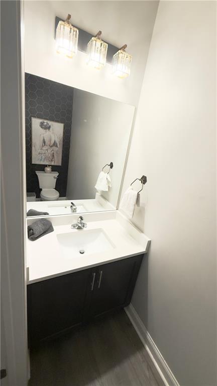 3370 Elkhorn Ridge Run Dacula, GA 30019 - Photo 26 of 29 a bathroom with a sink and a mirror