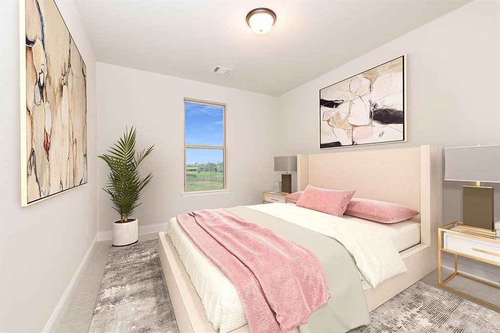 216 Lk Frst Trail Anna, TX 75409 - Photo 6 of 9 a bedroom with a large bed and a painting on the wall