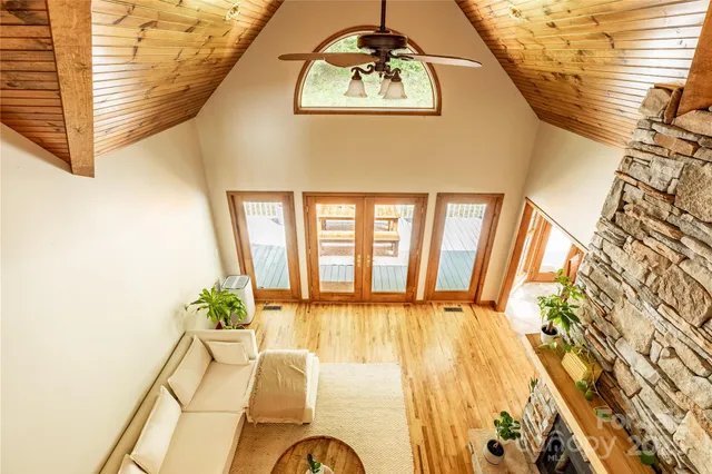a view of an entryway with wooden floor