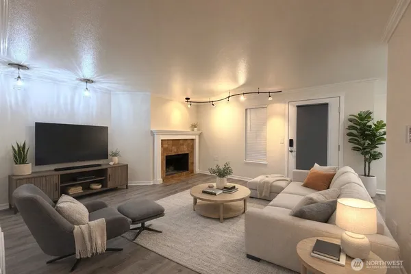 a living room with furniture and a flat screen tv