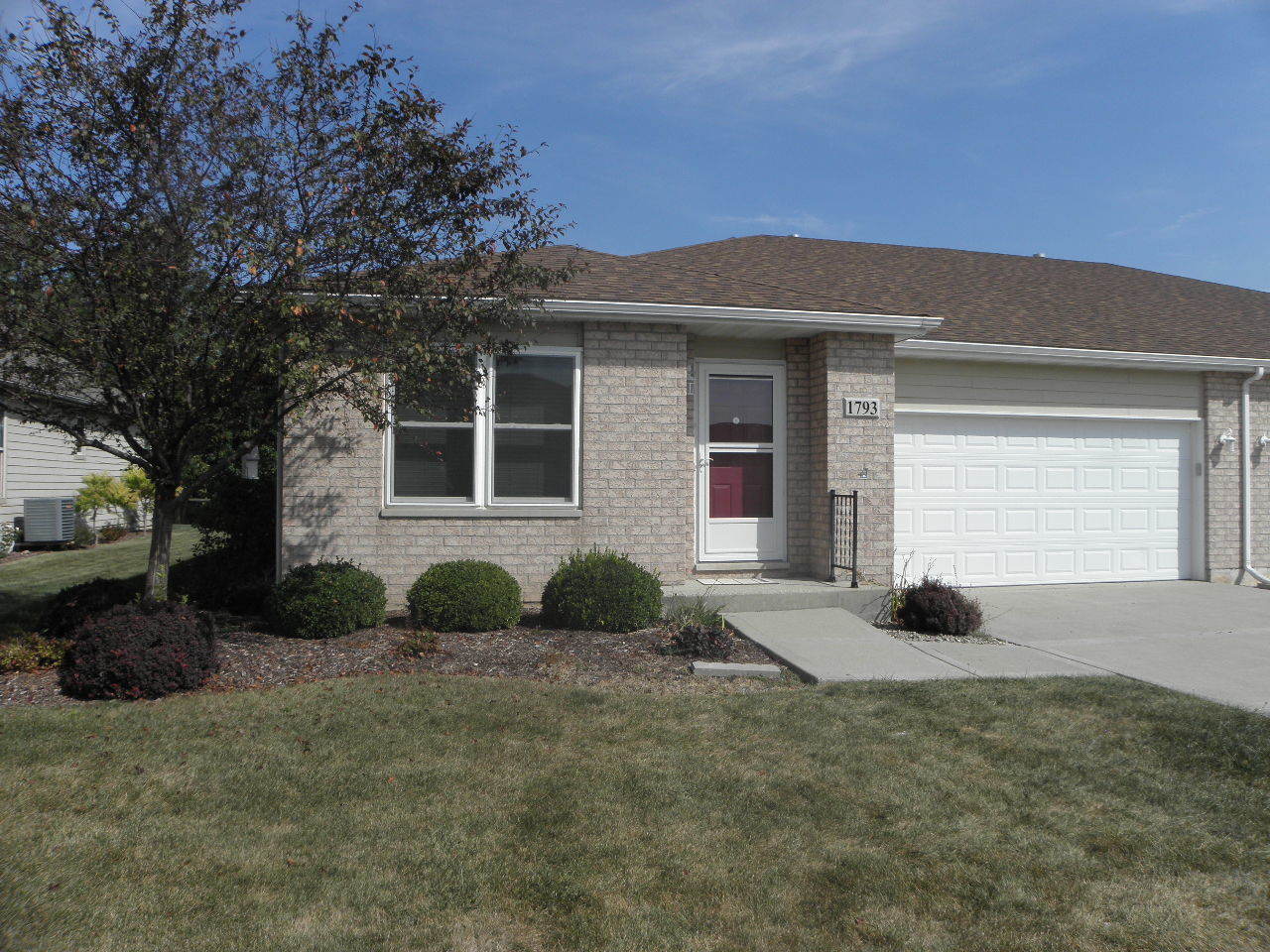 1793 Red Willow Road Morris, IL 60450 - Photo 1 of 22 a front view of a house with garden