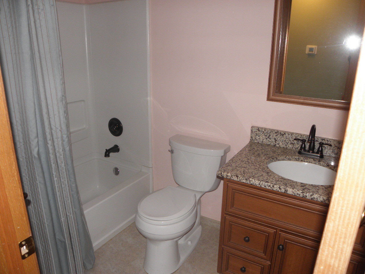 1793 Red Willow Road Morris, IL 60450 - Photo 18 of 22 a bathroom with a granite countertop sink toilet and shower