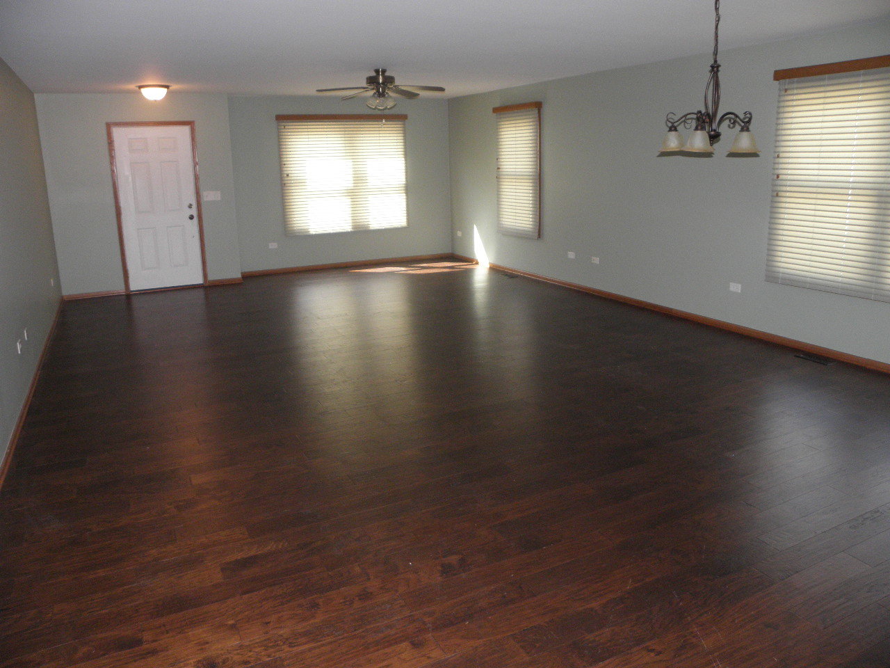 1793 Red Willow Road Morris, IL 60450 - Photo 9 of 22 an empty room with wooden floor and windows