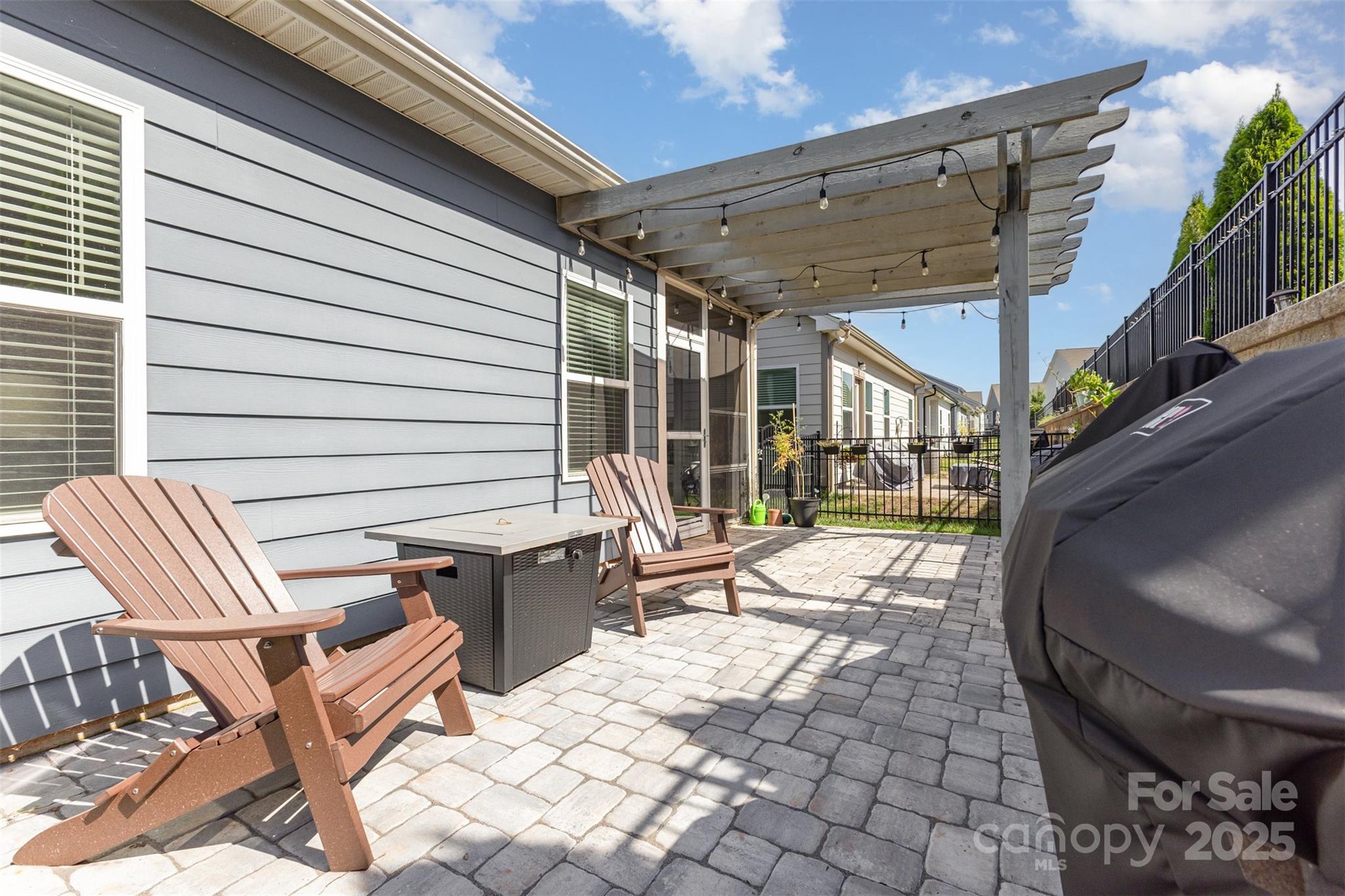 26043 Appleyard Court Lancaster, SC 29720 - Photo 17 of 23 a view of a patio with a table and chairs