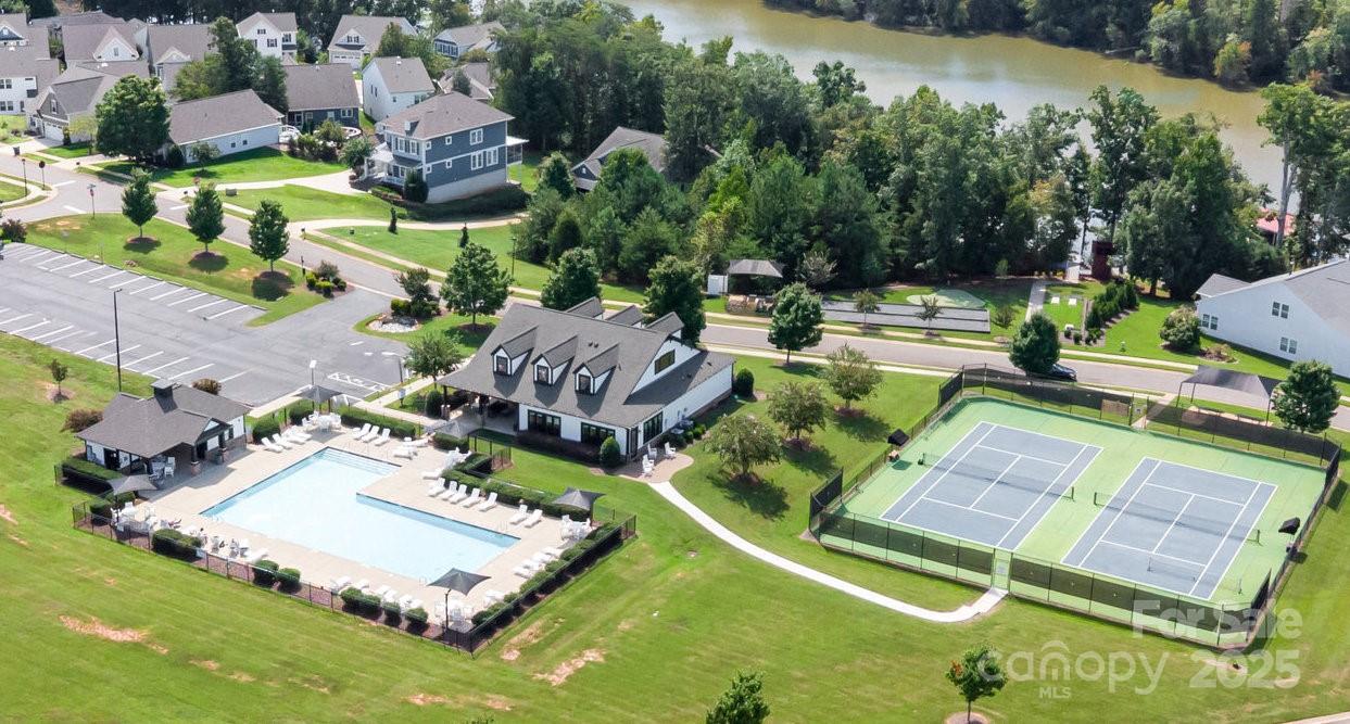 26043 Appleyard Court Lancaster, SC 29720 - Photo 18 of 23 a view of a swimming pool with a patio