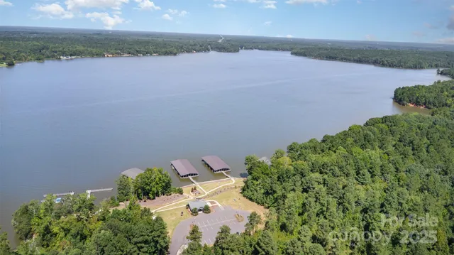 a view of a lake with a yard
