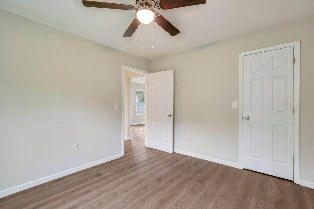 183 Earl Ezell Road Spring City, TN 37381 - Photo 15 of 30 a view of an empty room and wooden floor