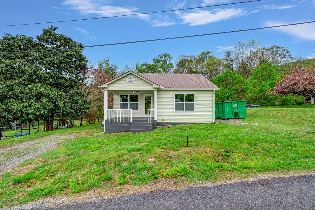 183 Earl Ezell Road Spring City, TN 37381 - Photo 2 of 30 a view of a house with a yard