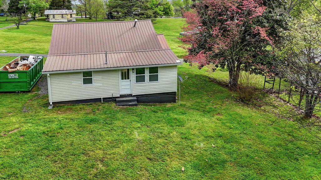 183 Earl Ezell Road Spring City, TN 37381 - Photo 30 of 30 a view of a house with a garden