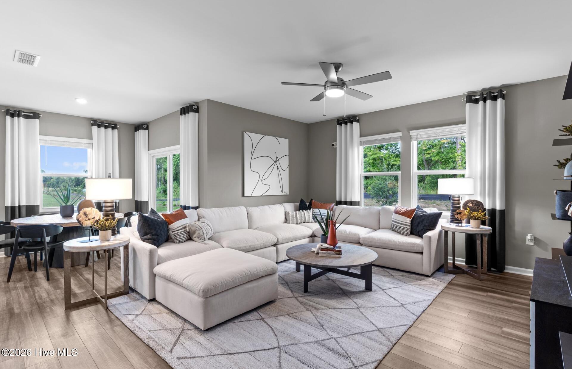 307 Currents Place Southeast, Unit 7401 Bolivia, NC 28422 - Photo 2 of 11 Photos are of one of our model homes for furniture placement ideas.