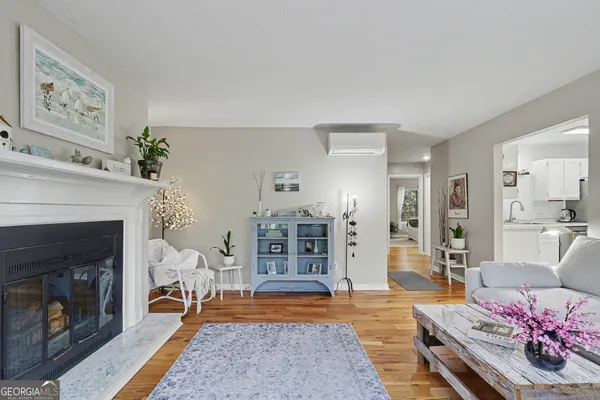 a kitchen with stainless steel appliances kitchen island granite countertop a refrigerator and a stove