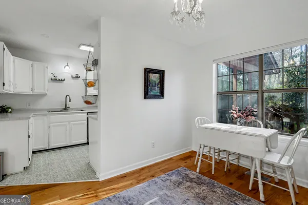 a bedroom with a bed and a mirror