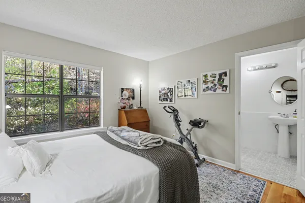 a view of a house with tub and chairs in patio
