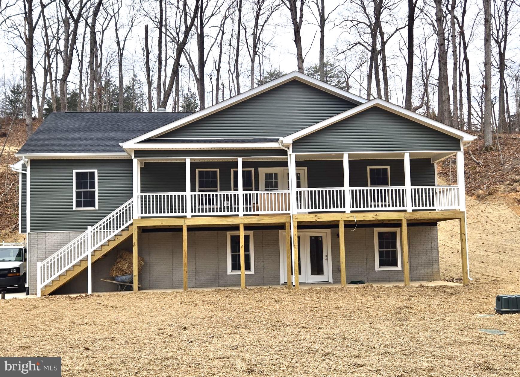 a house with trees in the background