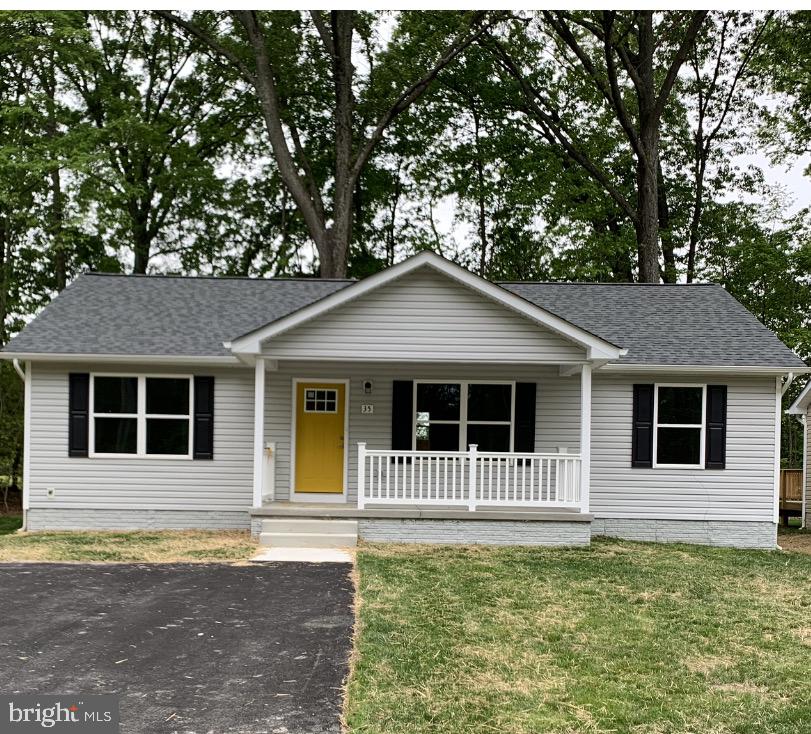 Exterior Front w  Concrete Porch & Asphalt Drive
