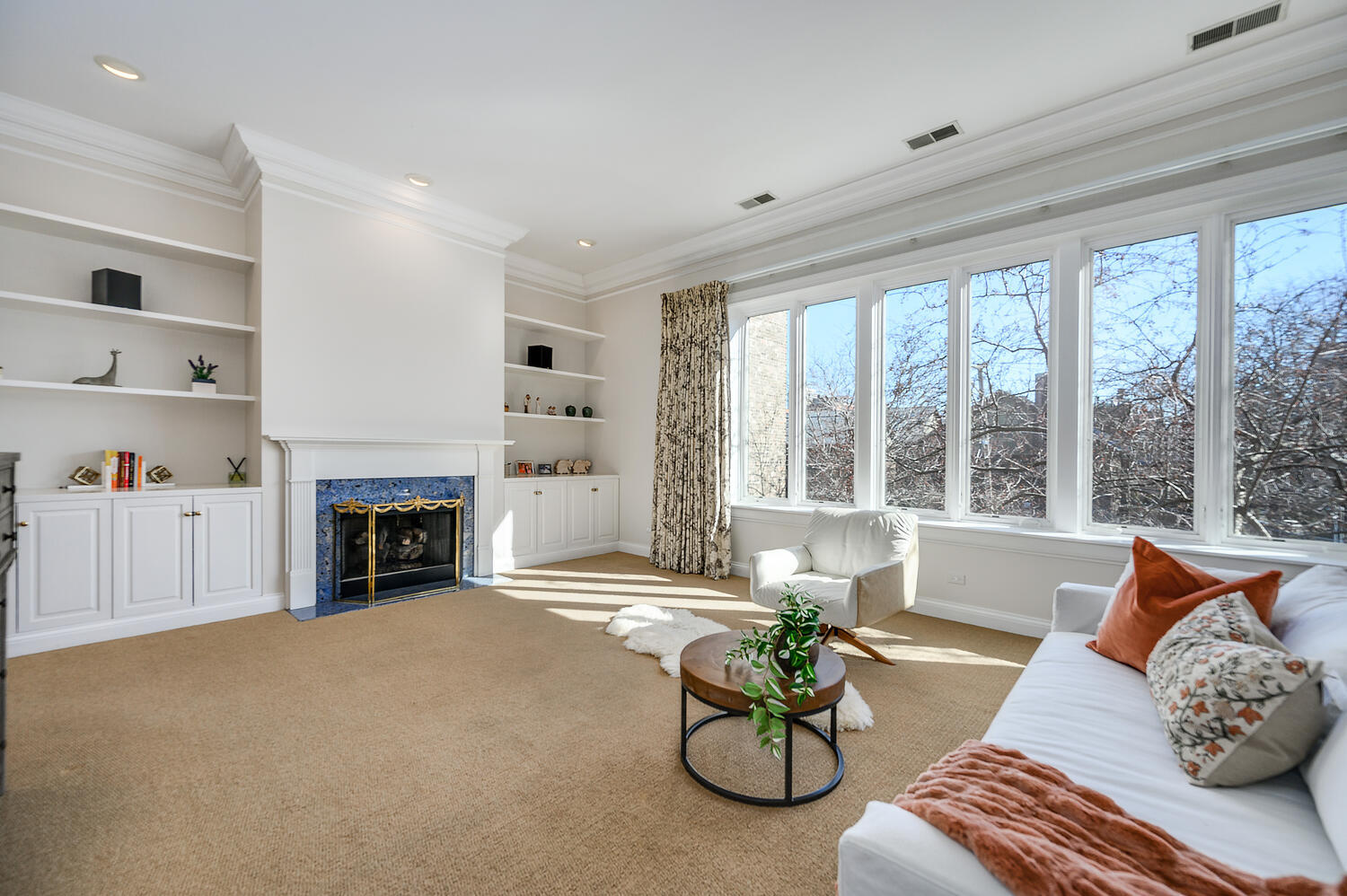 1833 North Howe Street Chicago, IL 60614 - Photo 20 of 41 a living room with furniture and a fireplace