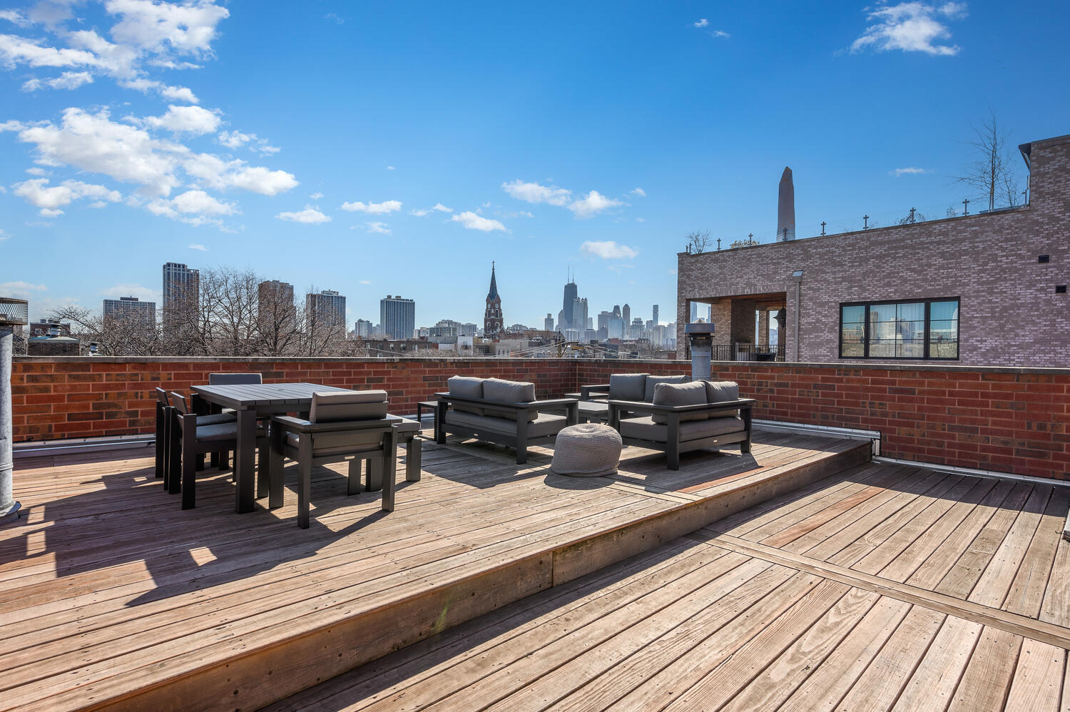 1833 North Howe Street Chicago, IL 60614 - Photo 2 of 41 a view of a roof deck with dining and living space