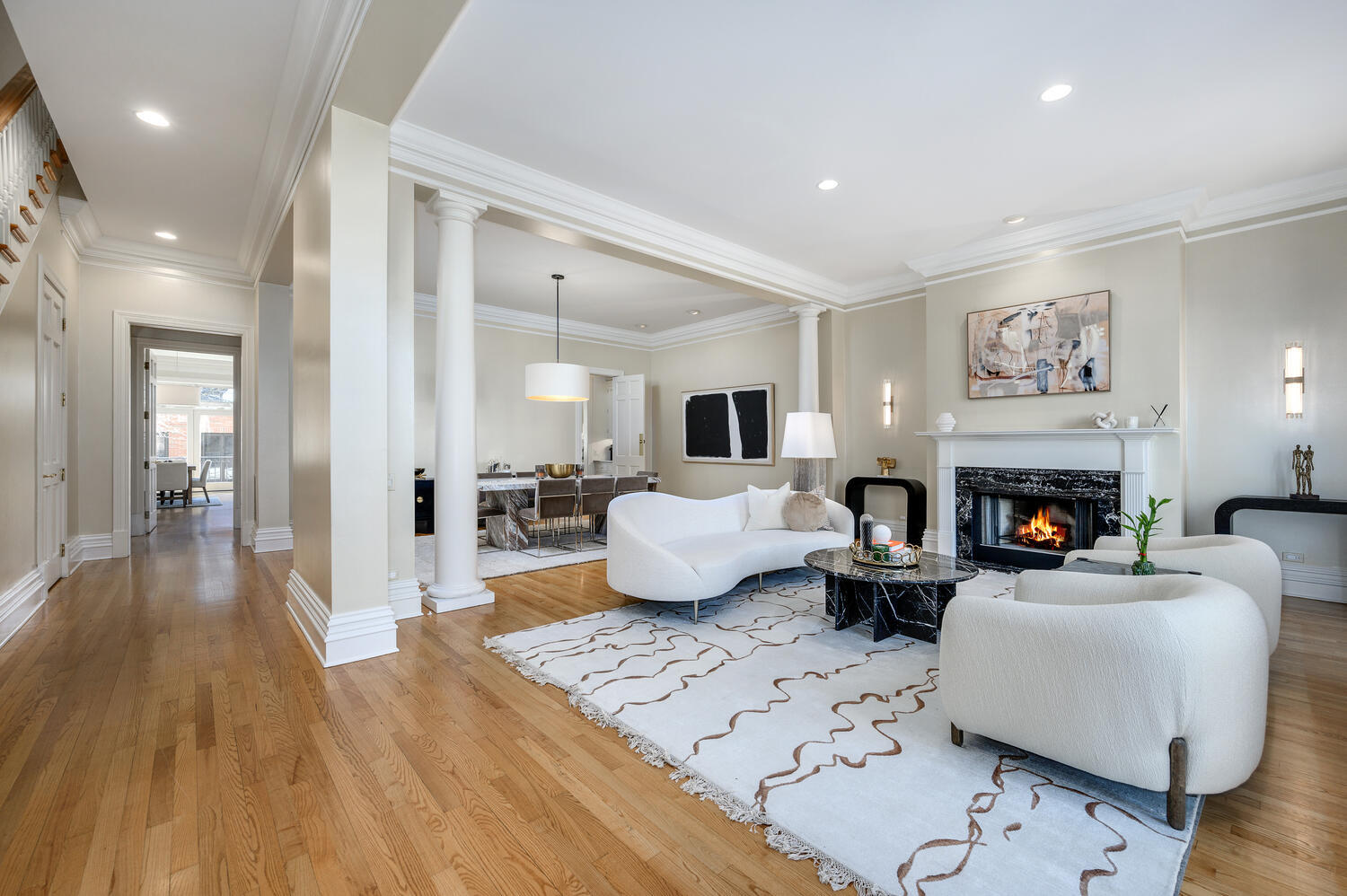 1833 North Howe Street Chicago, IL 60614 - Photo 3 of 41 a living room with furniture wooden floor and a fireplace