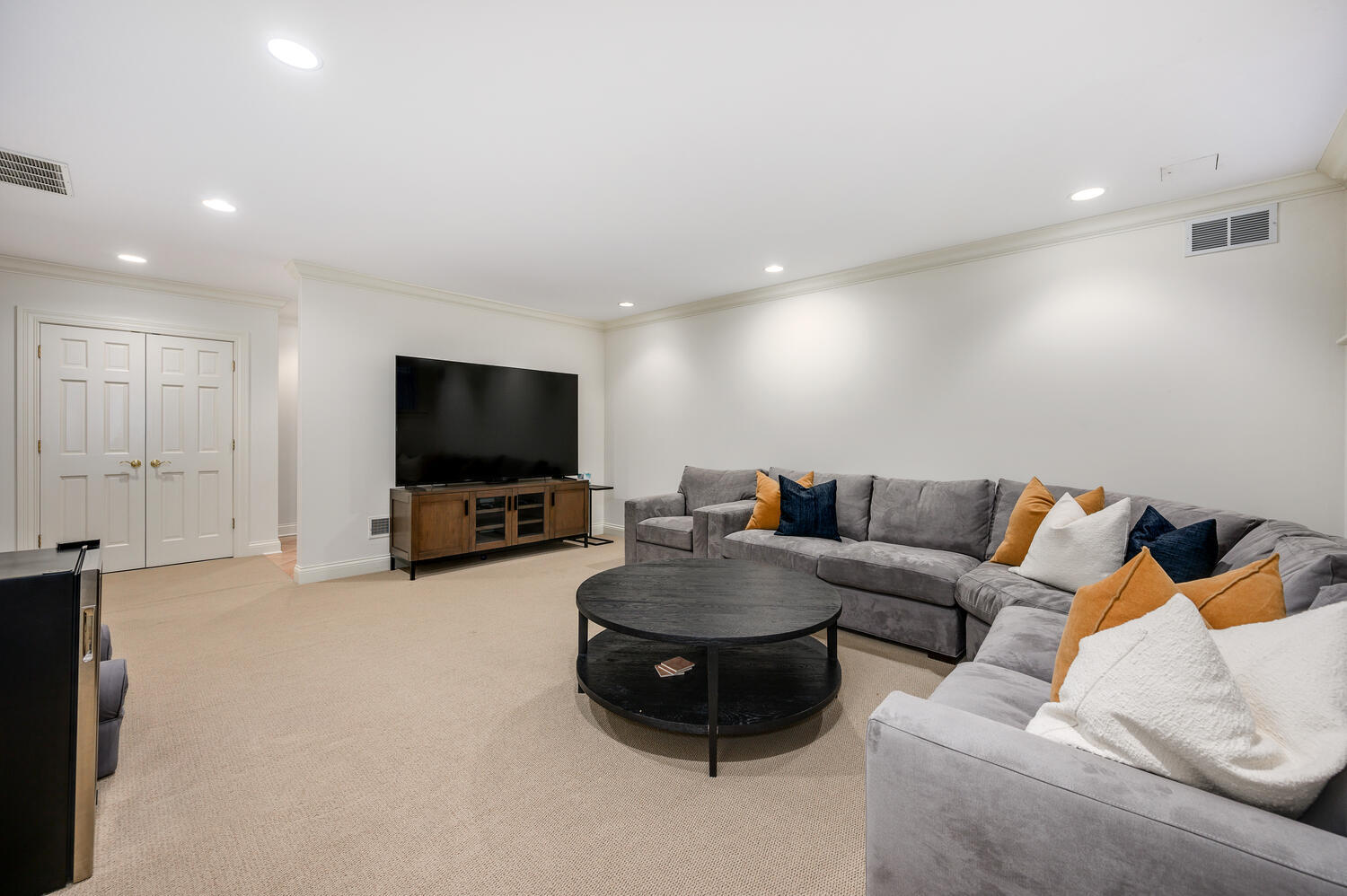 1833 North Howe Street Chicago, IL 60614 - Photo 35 of 41 a living room with furniture and a flat screen tv