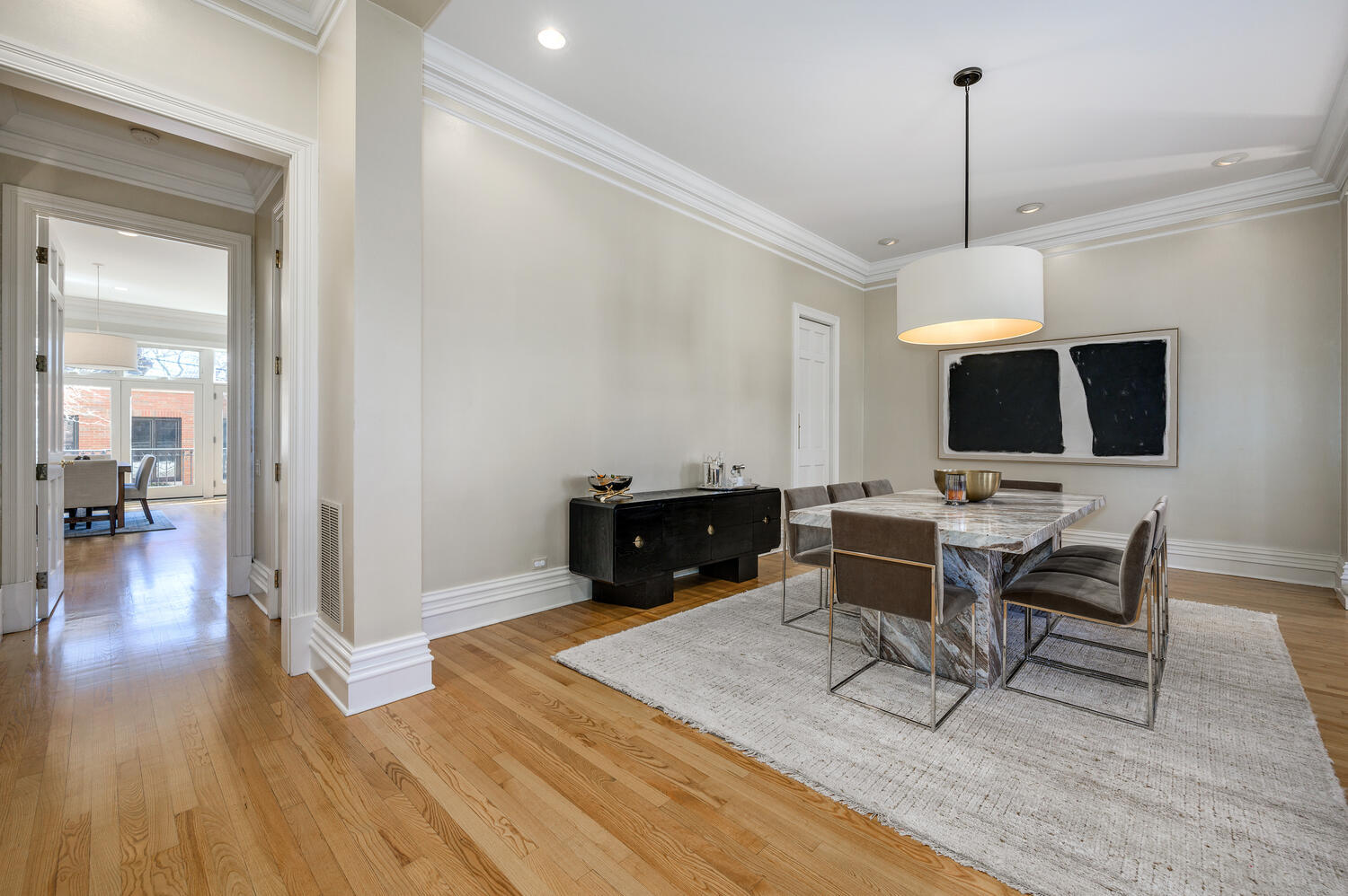 1833 North Howe Street Chicago, IL 60614 - Photo 8 of 41 a living room with furniture a flat screen tv and kitchen view