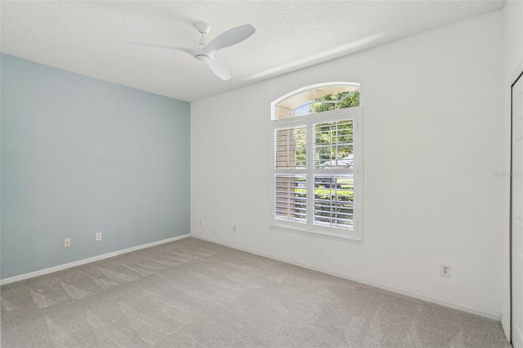 2230 Ridgewind Way Windermere, FL 34786 - Photo 26 of 38 an empty room with a window
