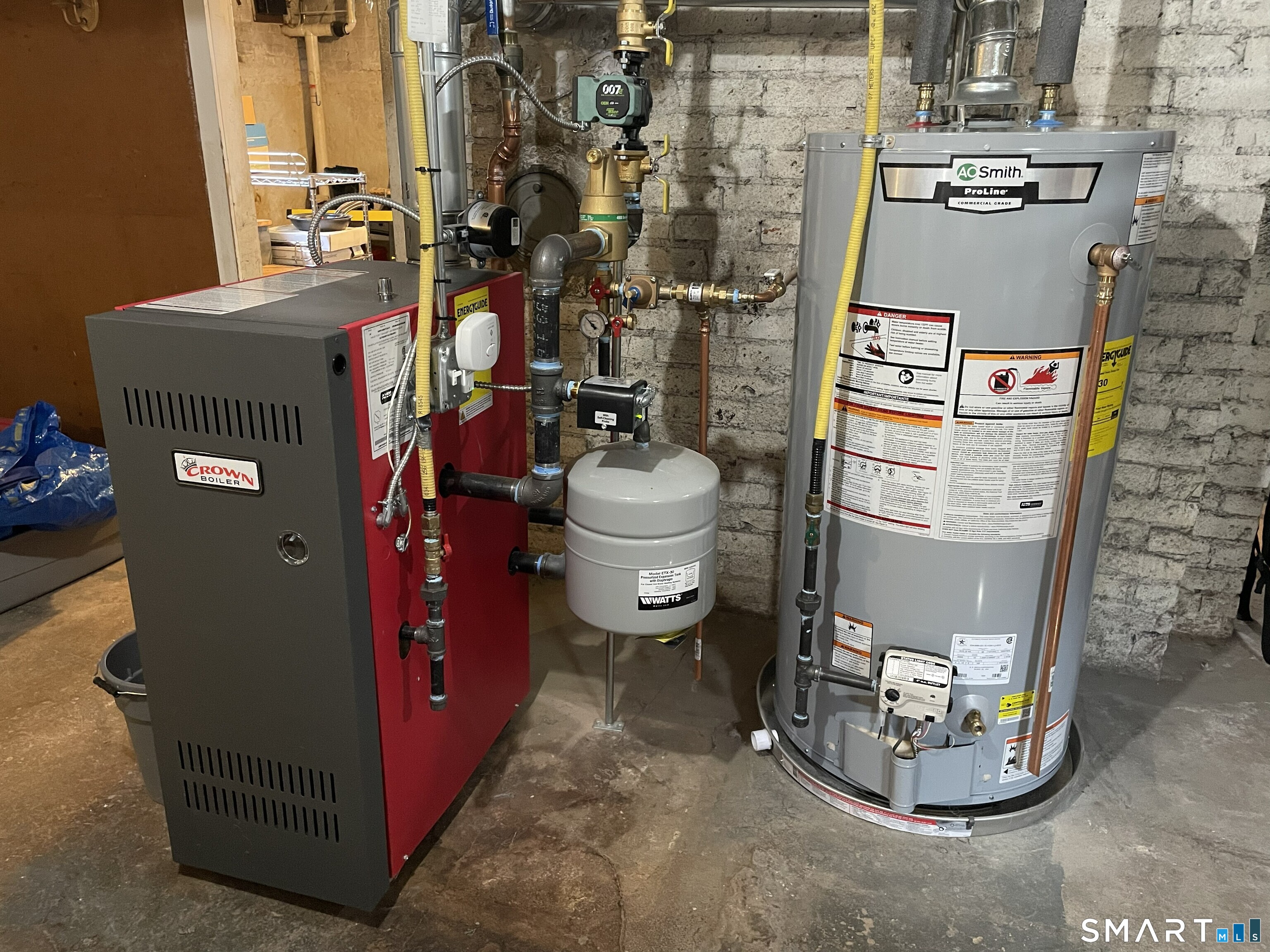 31 Elihu Street Hamden, CT 06517 - Photo 11 of 11 a view of a room with water heater and racks
