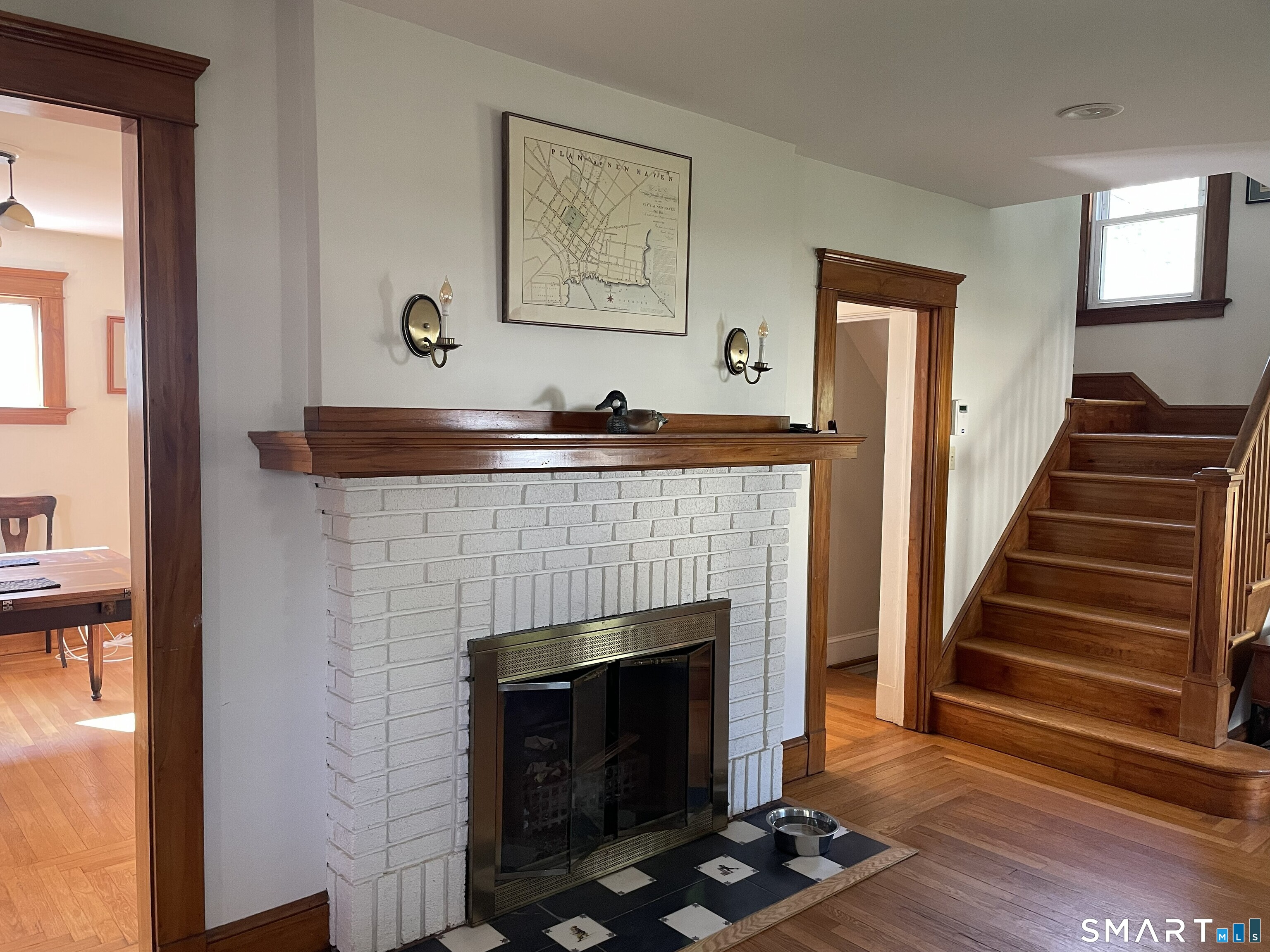 31 Elihu Street Hamden, CT 06517 - Photo 5 of 11 a living room with furniture and a fireplace