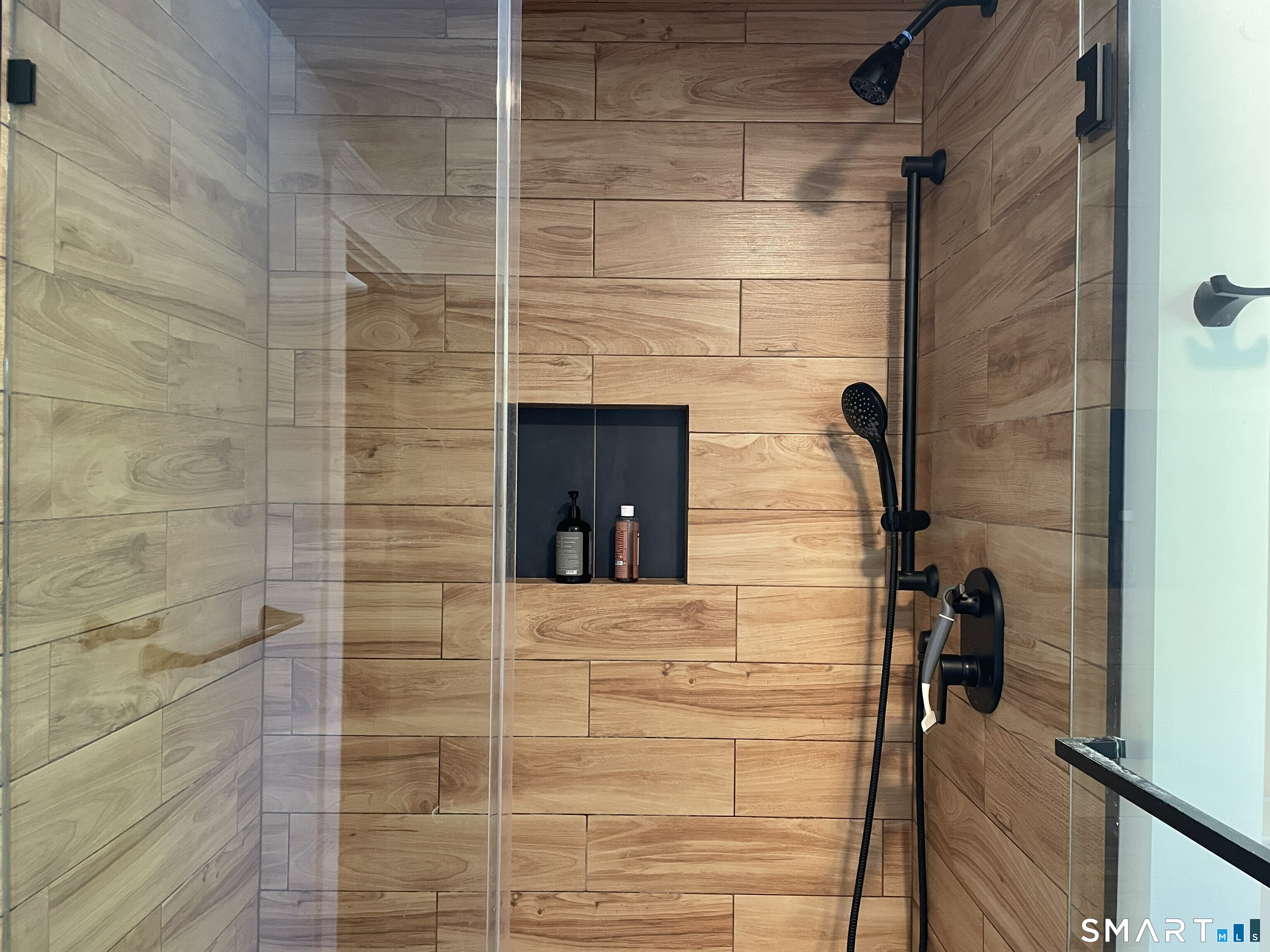31 Elihu Street Hamden, CT 06517 - Photo 9 of 11 a bathroom with a shower