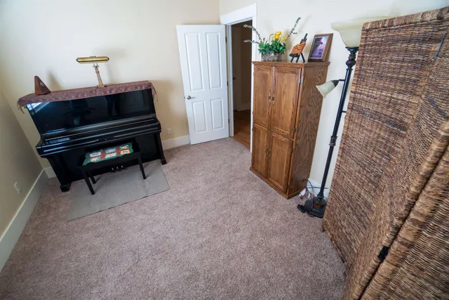 a view of front door and porch with furniture