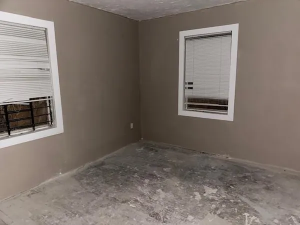 a view of a room that has a window in it