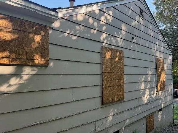 a small place with a window and brick wall