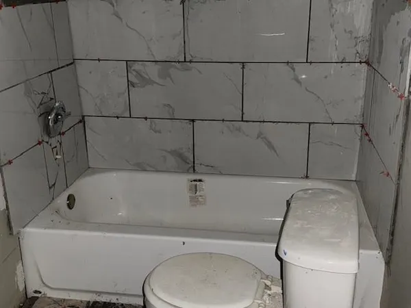 a bathroom with a sink and a toilet