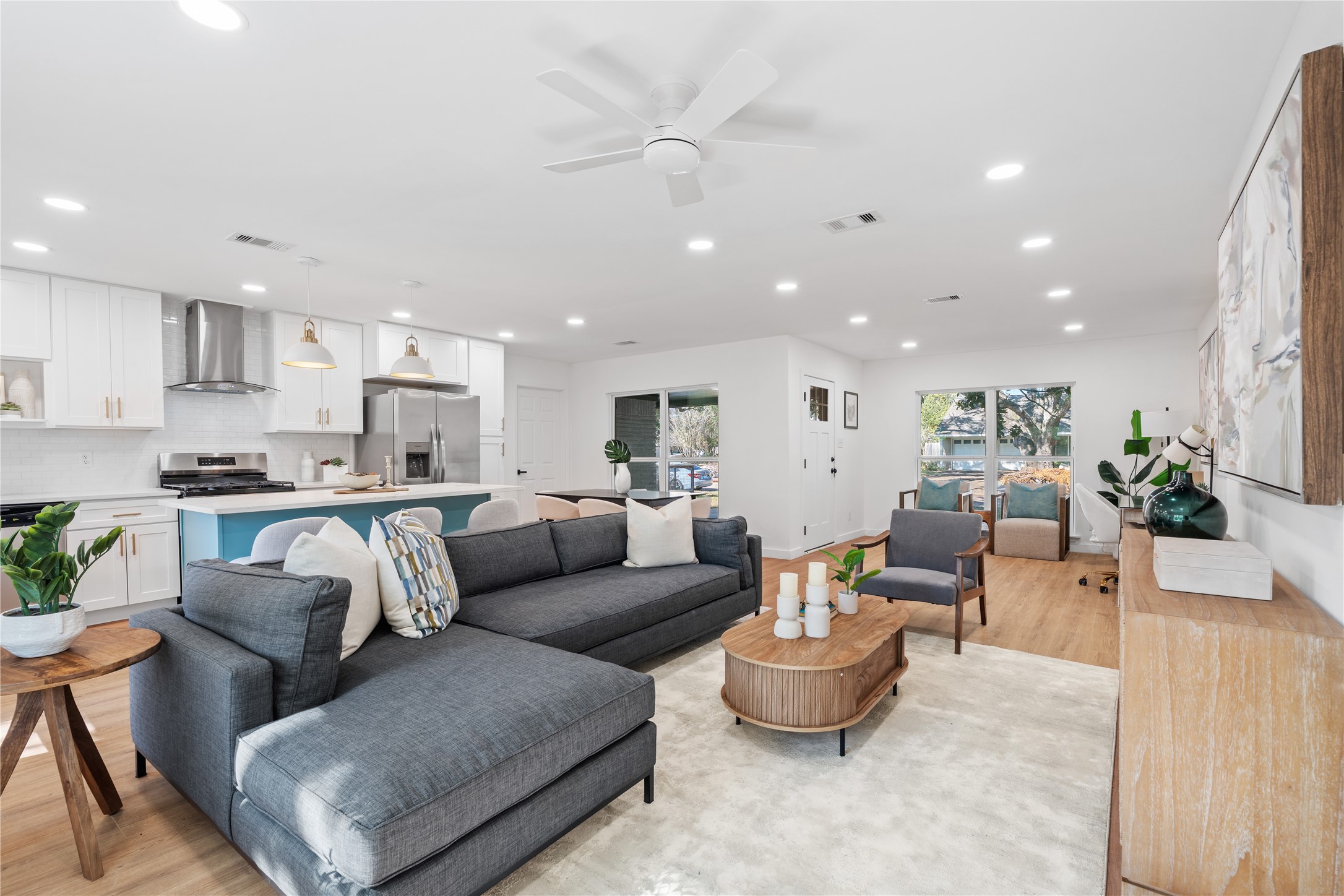 4427 Sanford Road Houston, TX 77035 - Photo 11 of 28 a living room with furniture and a view of kitchen