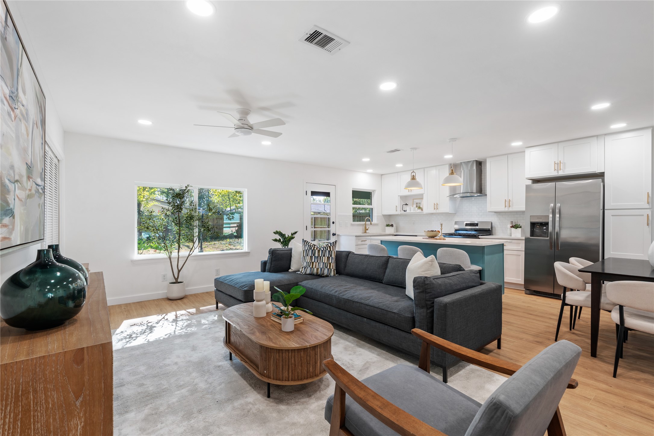 4427 Sanford Road Houston, TX 77035 - Photo 12 of 28 a living room with furniture and a large window