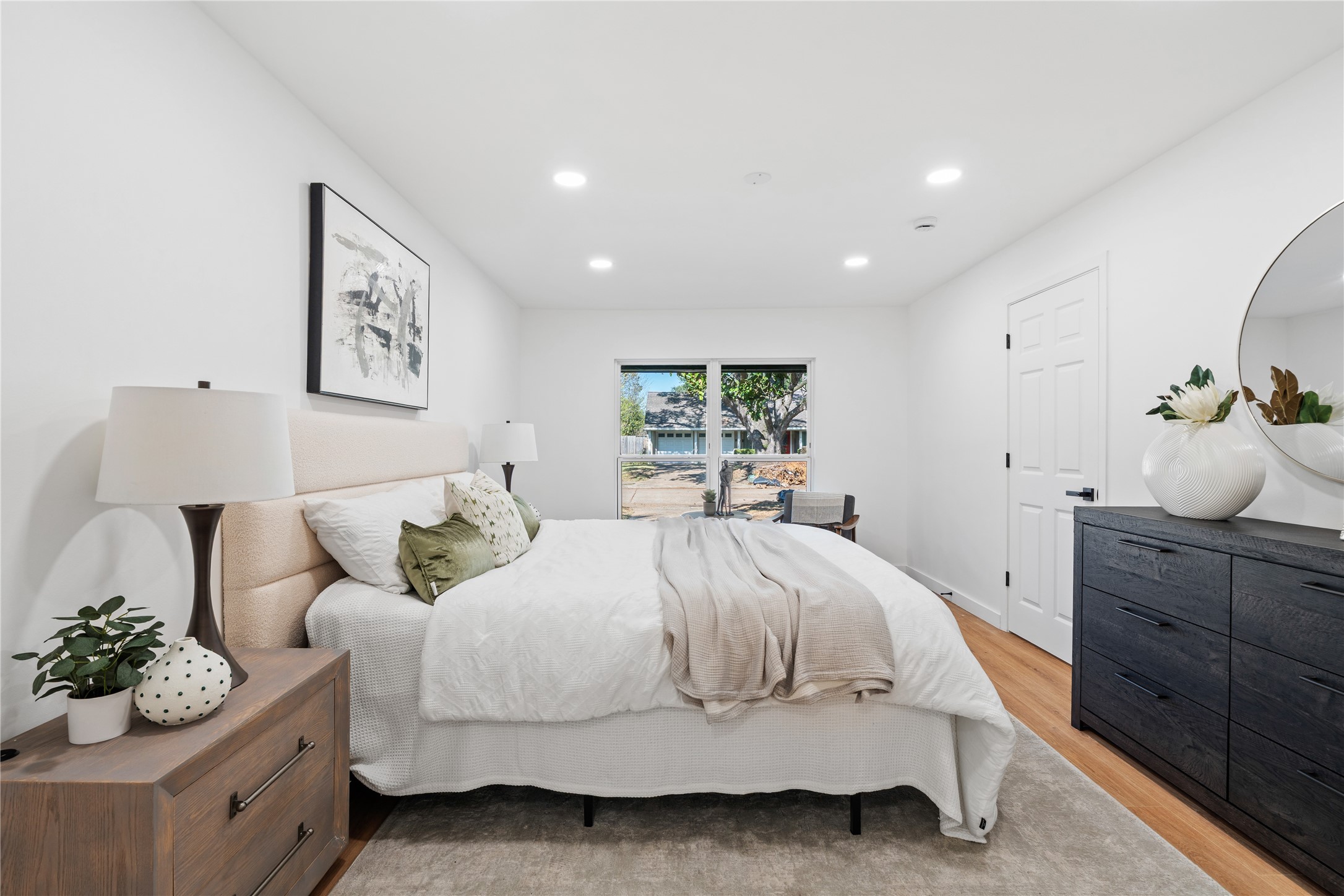 4427 Sanford Road Houston, TX 77035 - Photo 18 of 28 a bedroom with a bed and a couch