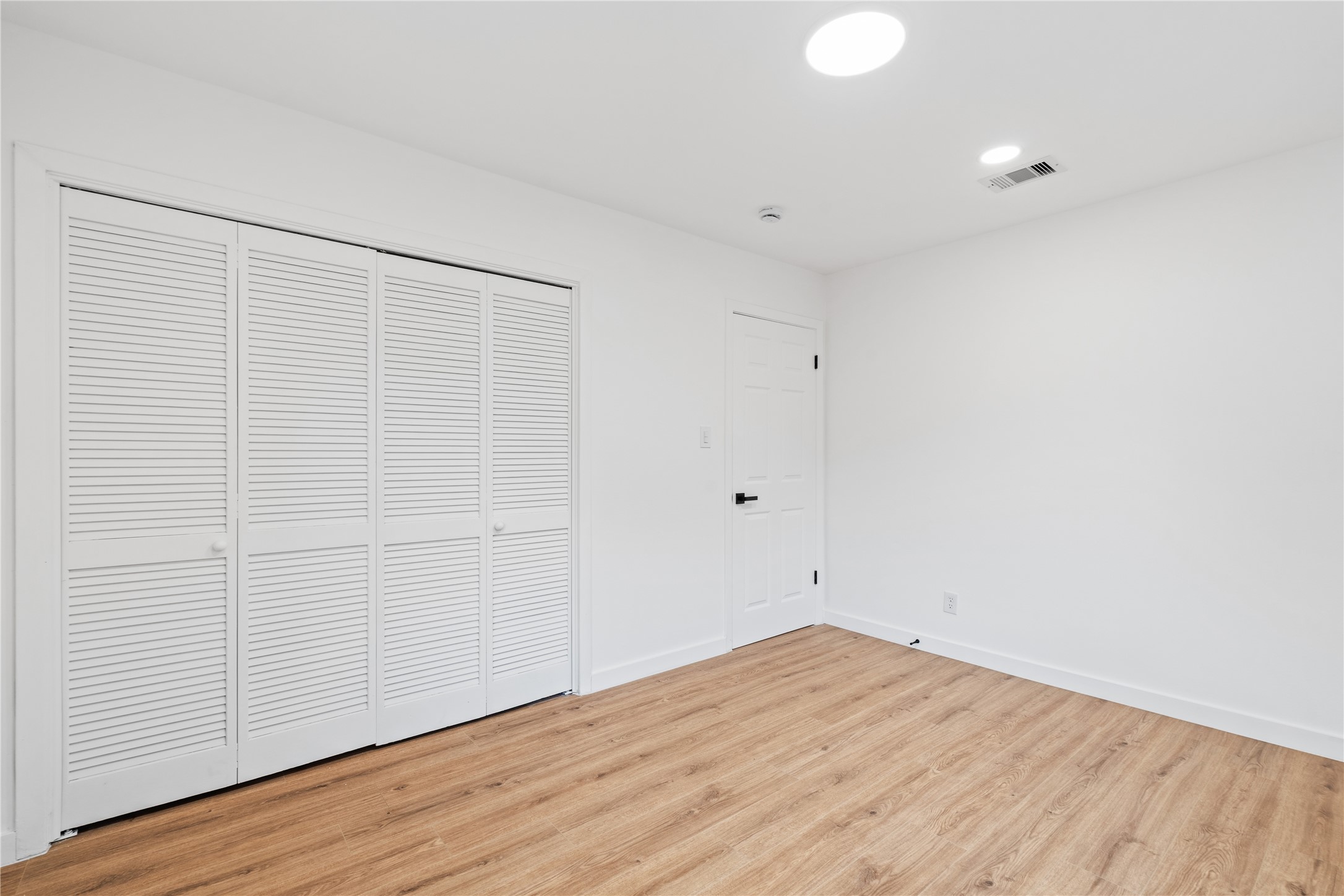 4427 Sanford Road Houston, TX 77035 - Photo 22 of 28 a view of empty room with wooden floor