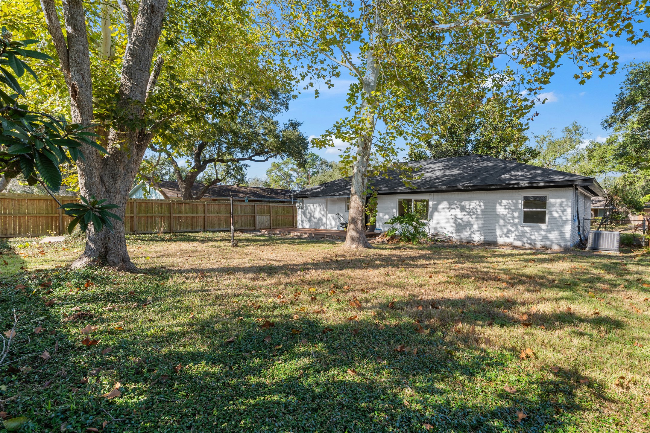 4427 Sanford Road Houston, TX 77035 - Photo 26 of 28 a view of a house with a yard