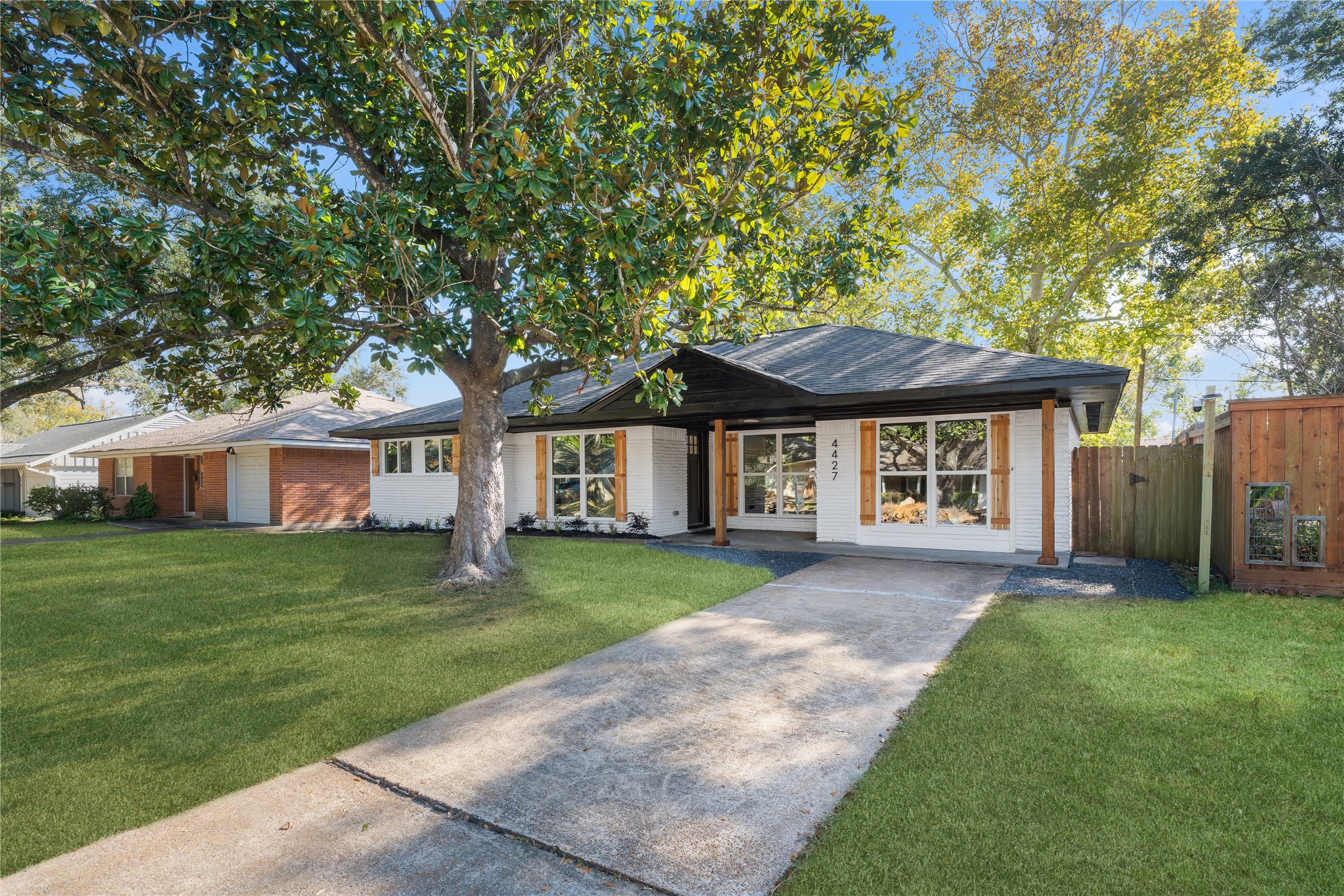 4427 Sanford Road Houston, TX 77035 - Photo 27 of 28 a front view of a house with a garden
