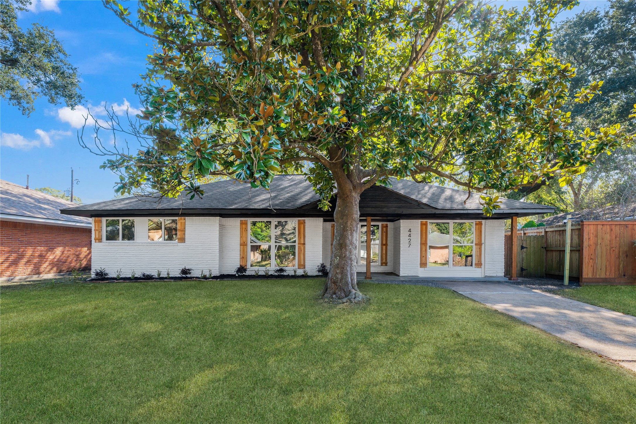4427 Sanford Road Houston, TX 77035 - Photo 28 of 28 a front view of house with yard and green space