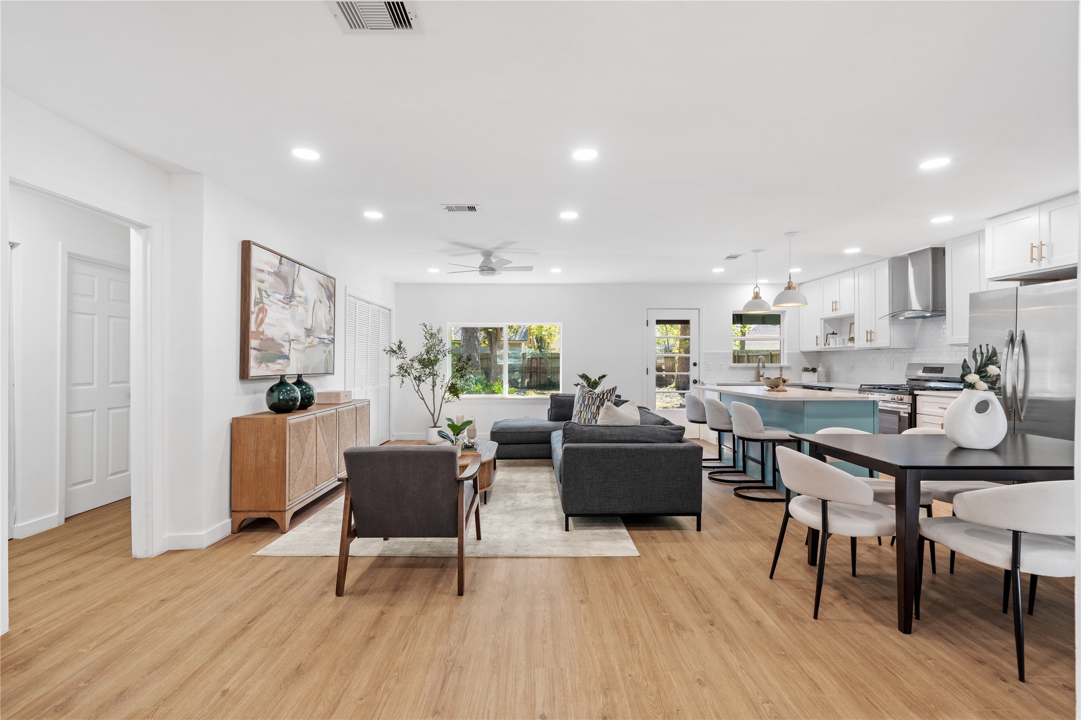 4427 Sanford Road Houston, TX 77035 - Photo 8 of 28 a living room with furniture and a wooden floor