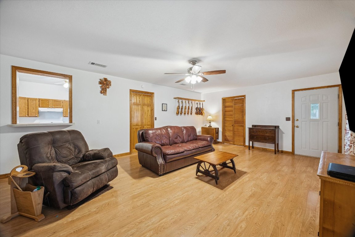 3502 1869th Ranch Liberty Hill, TX 78642 - Photo 8 of 18 a living room with furniture and wooden floor