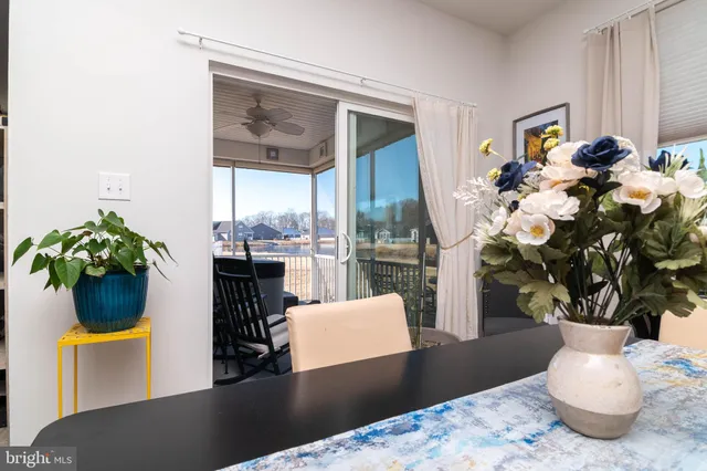 a view of a living room and dining room