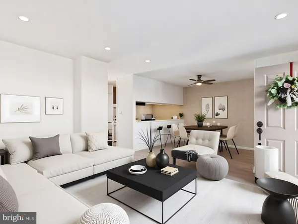 a living room with furniture and a table