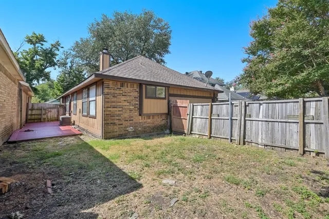 a view of a house with a garage