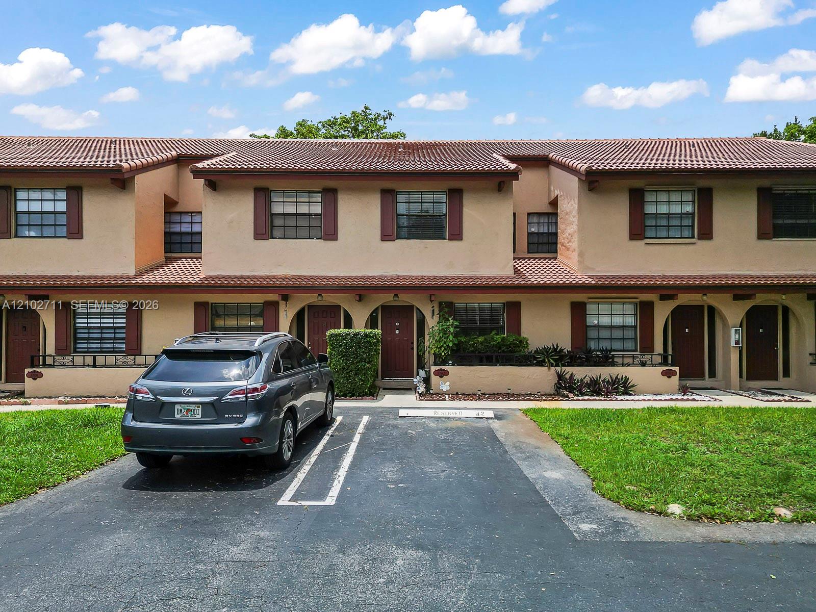 10942 West Sample Road Coral Springs, FL 33065 - Photo 1 of 32 Gallery Image 1