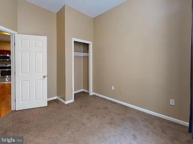 an empty room with closet