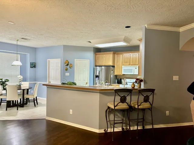a view of a livingroom with furniture and a couch