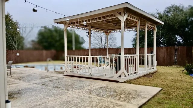 a view of a park with large trees