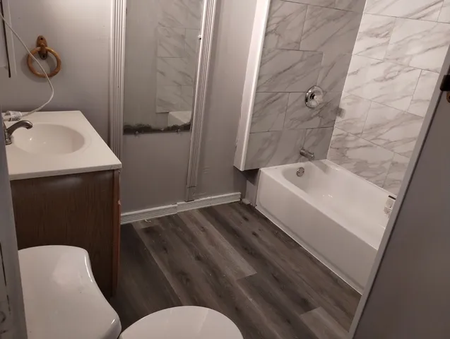 a bathroom with a sink and a toilet